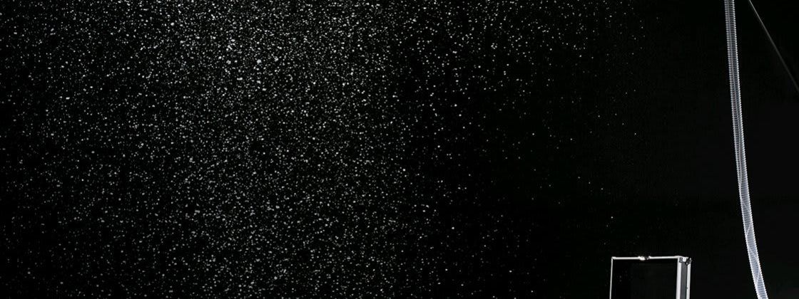 Antari snow machine spraying flakes through hose nozzle
