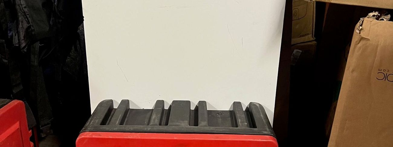 Red mobile fire point trolley with extinguisher box, evacuator alarm and fire signage