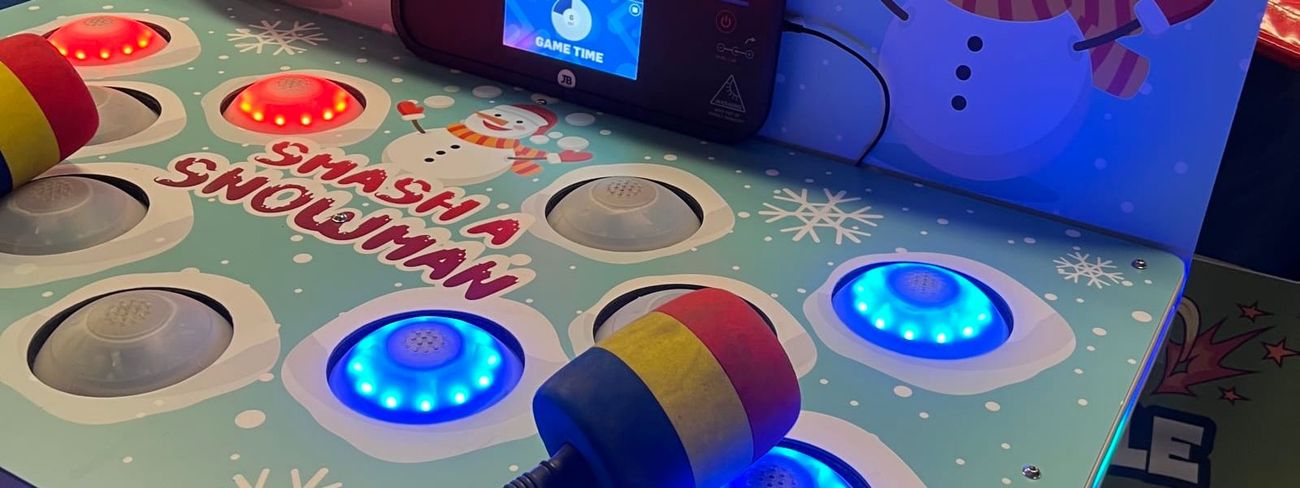 Close-up of the lit-up game with mallet ready