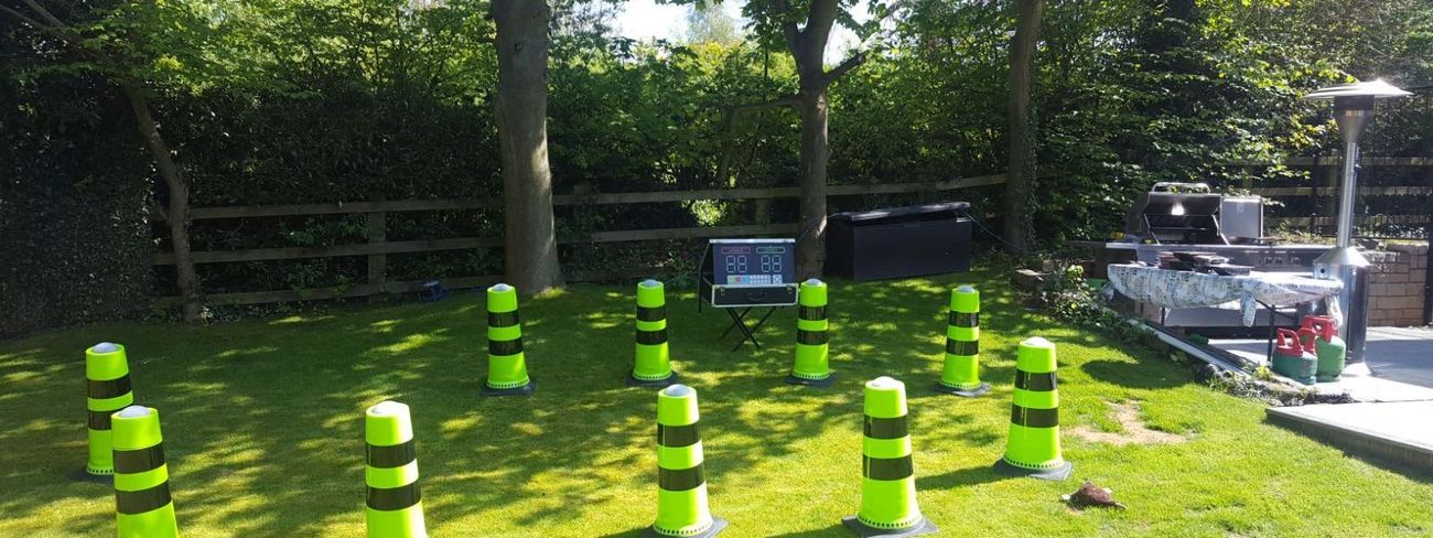 Podium cones laid out on a sunny garden lawn
