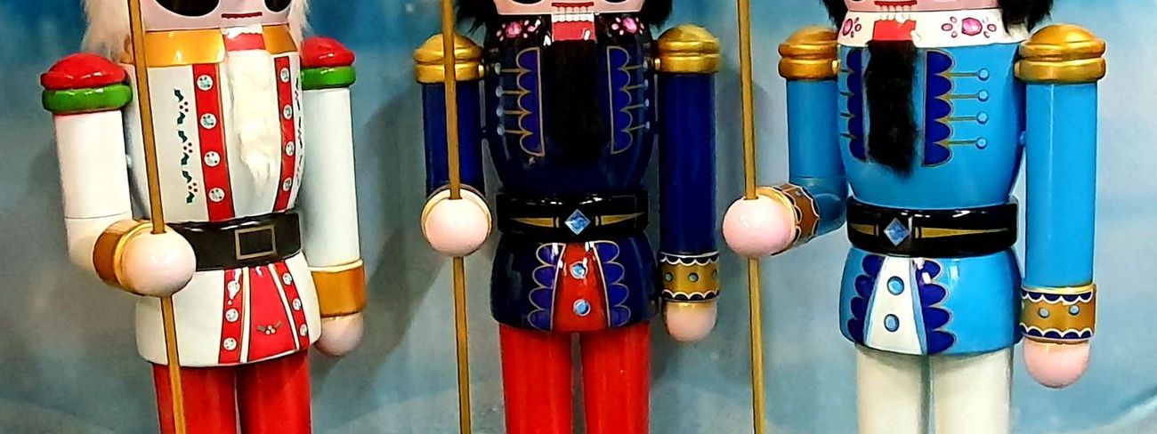 Trio of 6ft nutcracker figures on green base