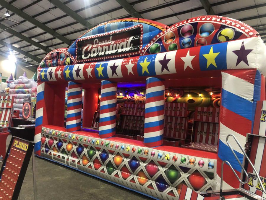 Carnival game stalls set up at an outdoor event