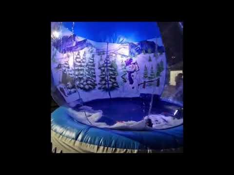 Christmas Giant Inflatable Snow Globe Hire in action
