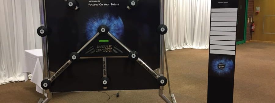 Branded exhibition stand with interactive games at a UK trade show