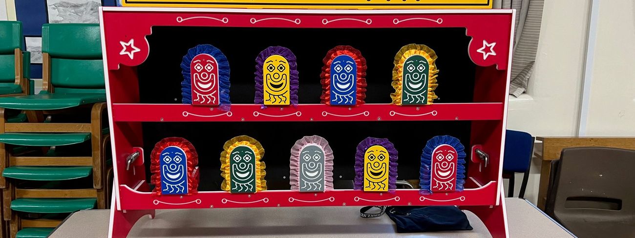 Clowning Around tabletop game with nine clown targets and six coloured beanbags