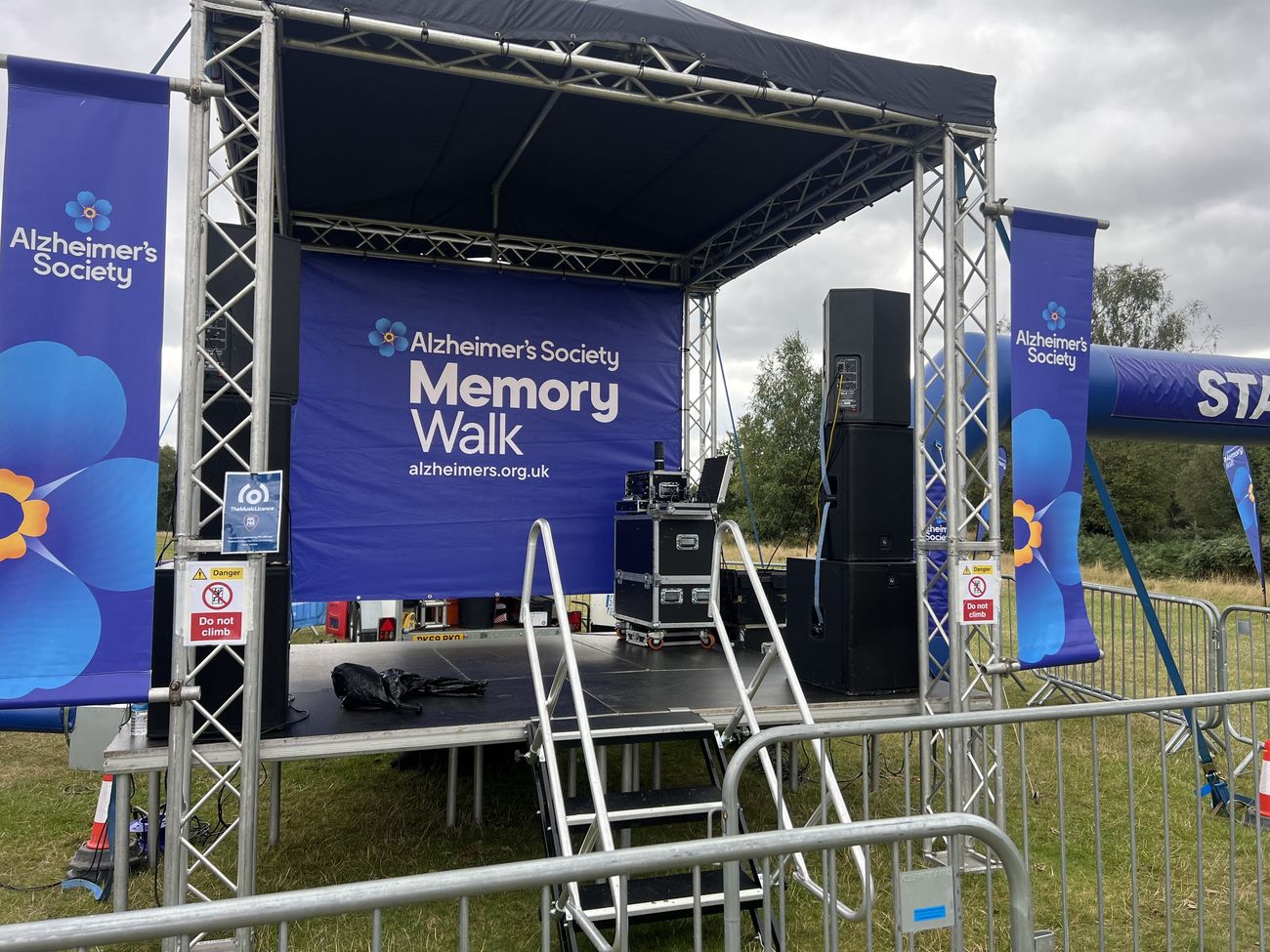 Branded mobile trailer stage at the Alzheimer's Society Memory Walk