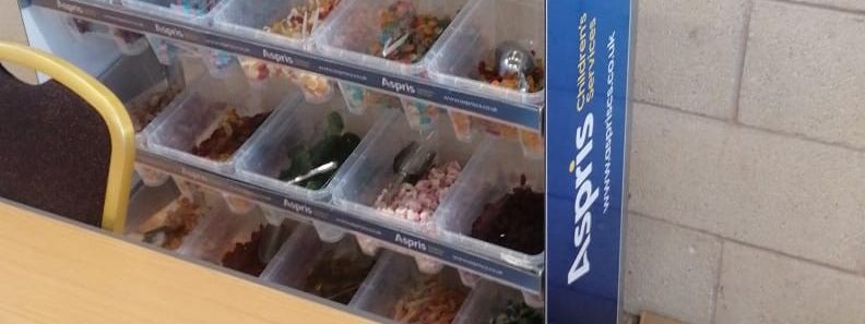 Branded Pick 'N' Mix sweetie stand with custom top and side panels