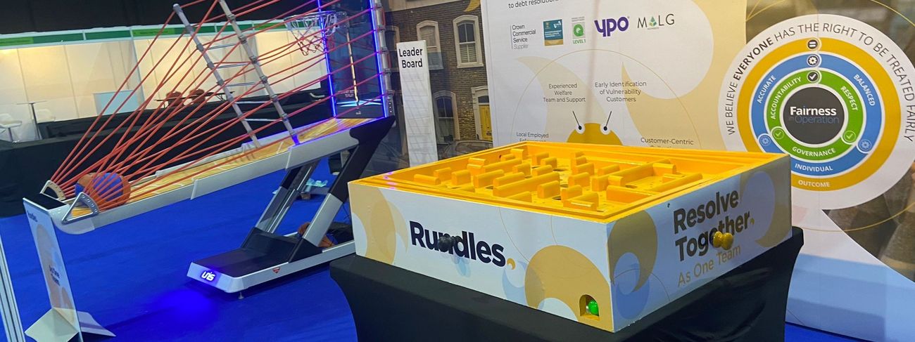 Exhibition stand with a giant labyrinth game and interactive basketball