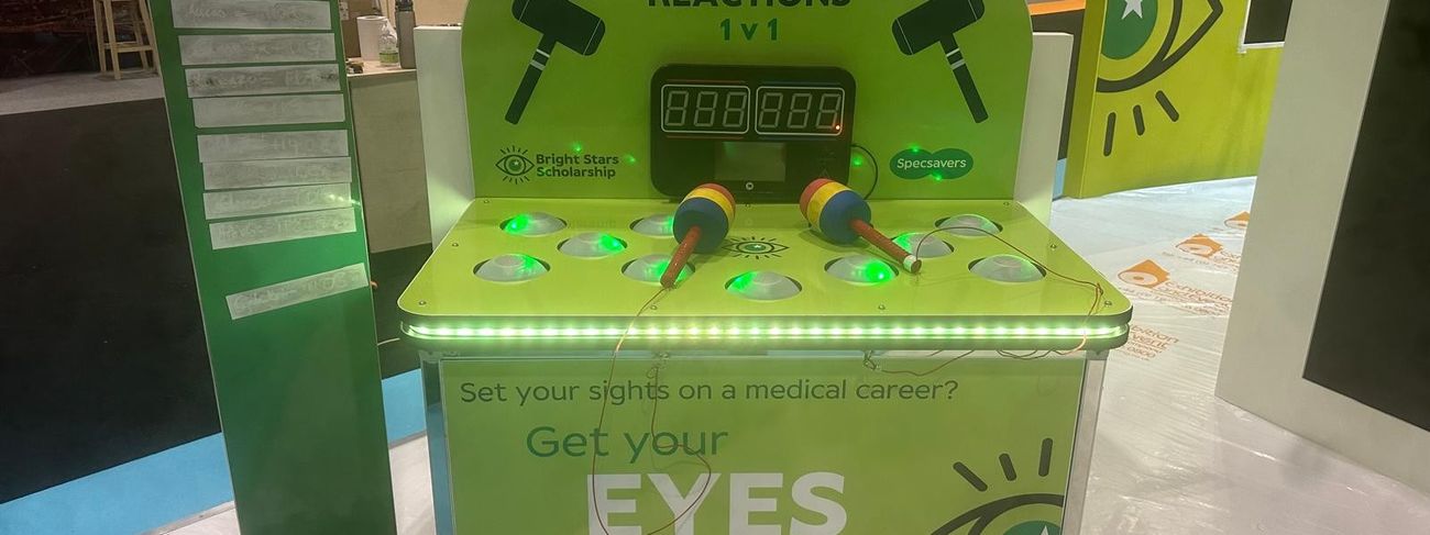 Whack a Mole game with full Specsavers branding on the side and top panels