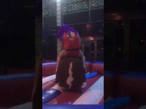 Mechanical rodeo bull in operation at an event
