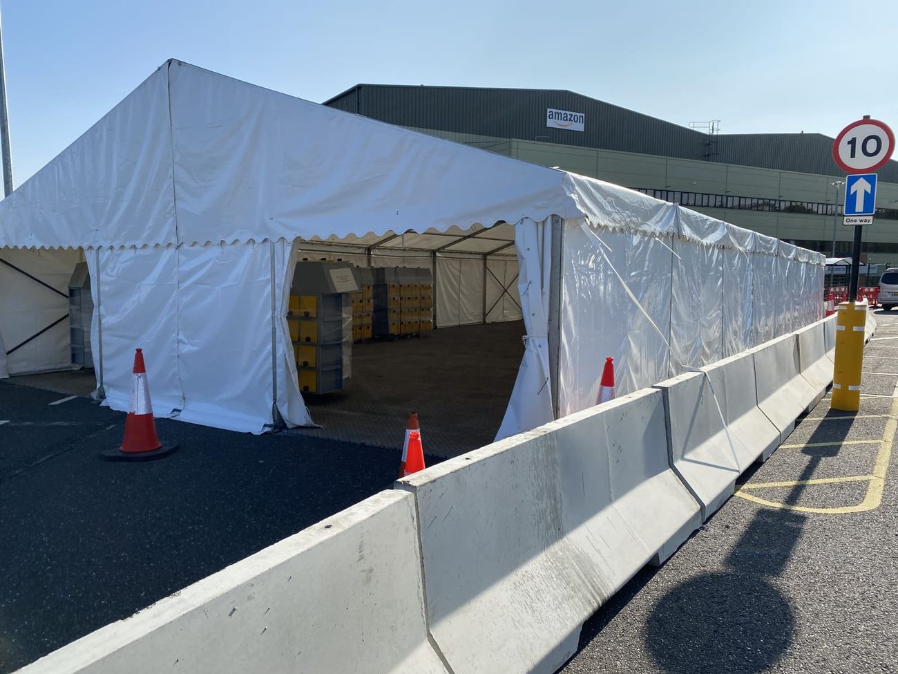 Barriers protecting marquee at Amazon site