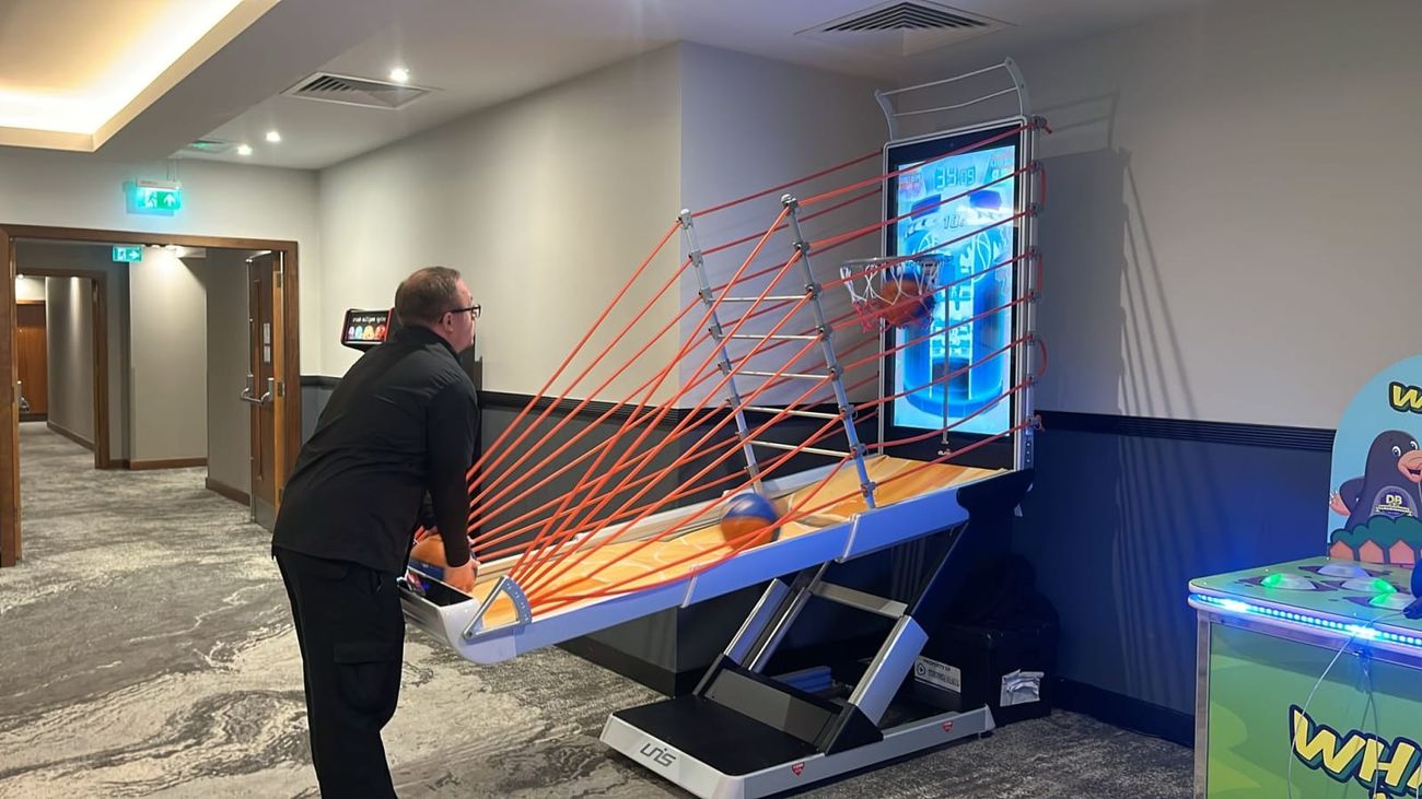Player taking a shot at indoor venue