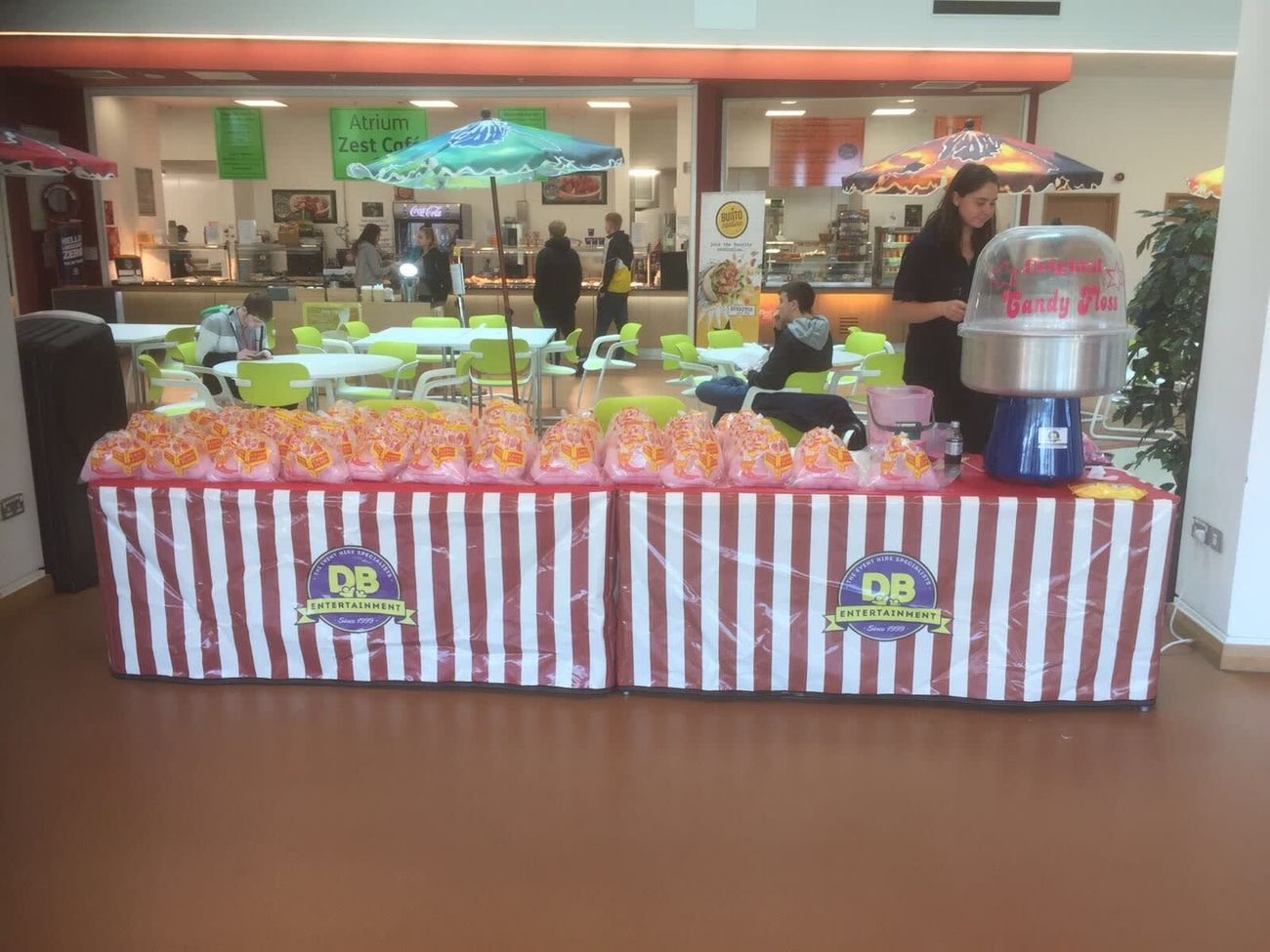 School cafeteria stall serving bagged candy floss