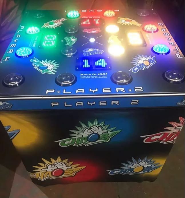 Close-up of glowing buttons and LED scoreboards