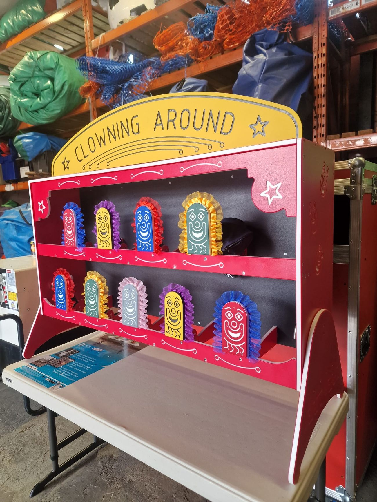Angled view of the Clowning Around tabletop cabinet with all nine targets upright