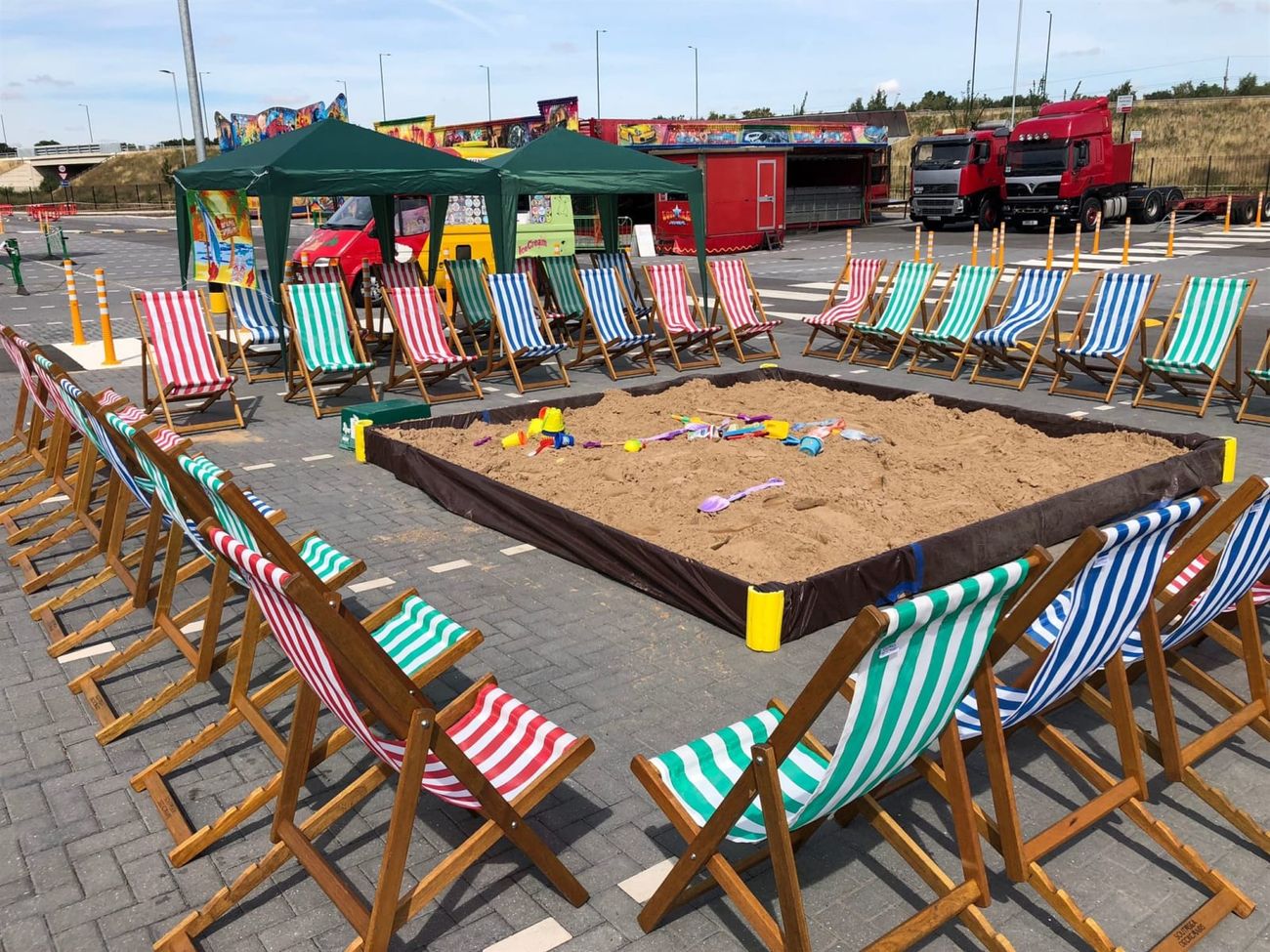 Seating circle around a sandpit at an event