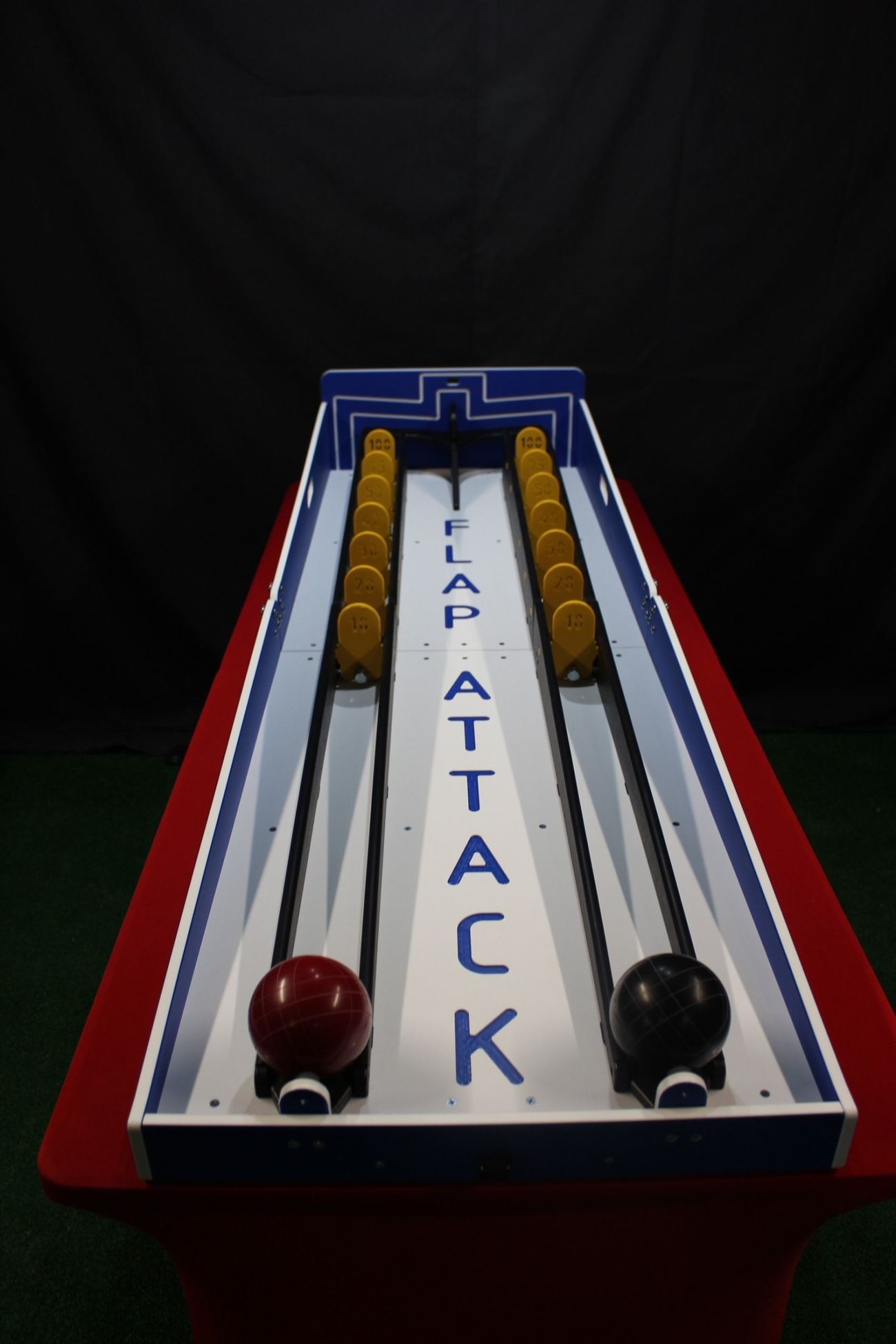 Overhead view of the two Flap Attack lanes with numbered yellow flaps running from 10 to 100
