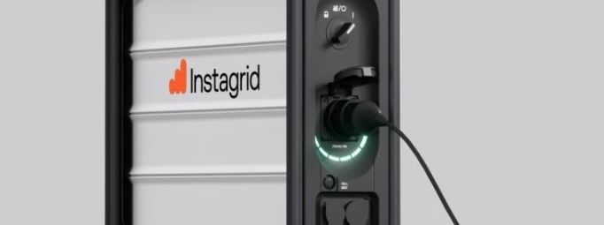 Instagrid ONE max portable battery generator with a cable plugged in and the status ring illuminated around the socket