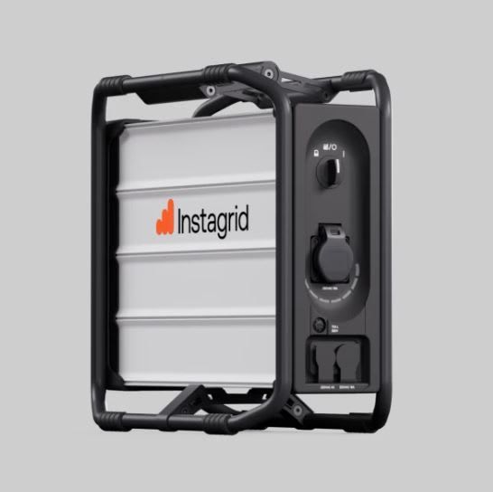 Three-quarter view of the Instagrid portable battery generator showing both AC and 230v sockets