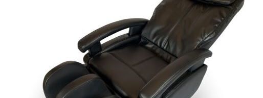Electric massage chair fully reclined with leg rest extended