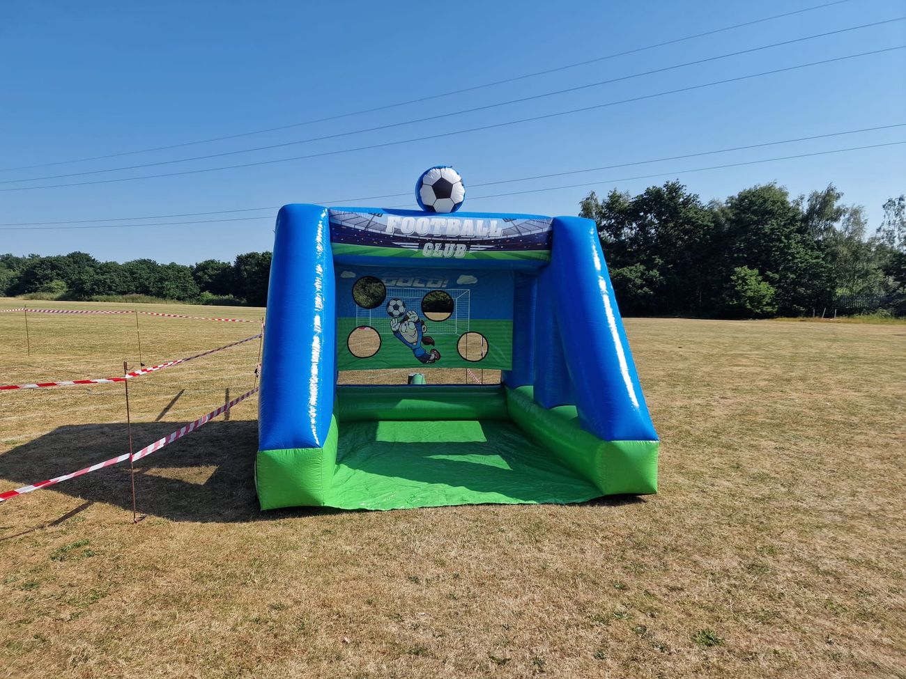 Speed radar unit beside a target goal at an outdoor corporate event