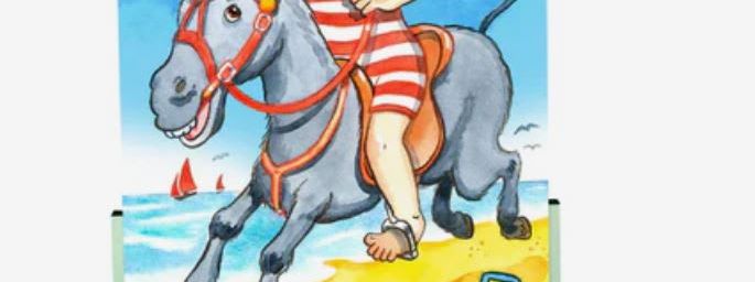 Painted face-in-the-hole board showing a boy in a red-and-white striped swimsuit riding a donkey on a beach, with a kite, sandcastle and sailboats in the background