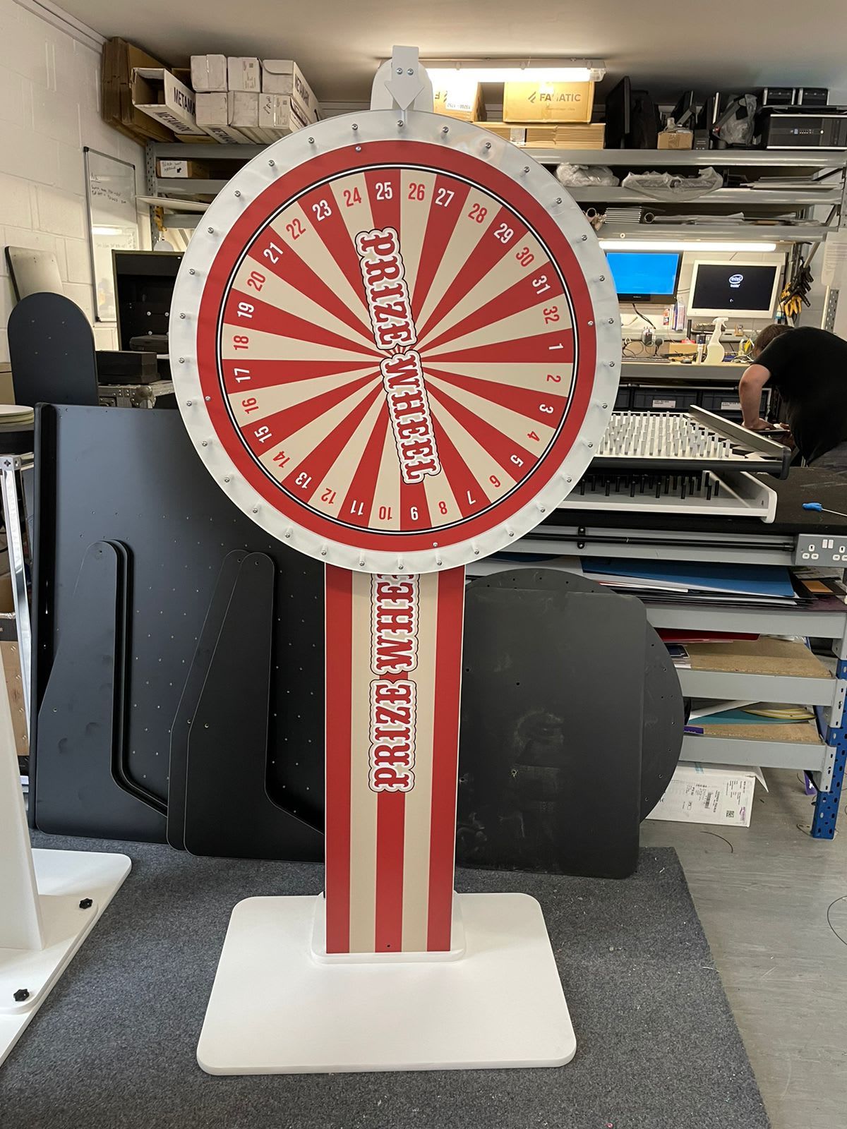 Prize Wheel ready in the workshop alongside other hire equipment