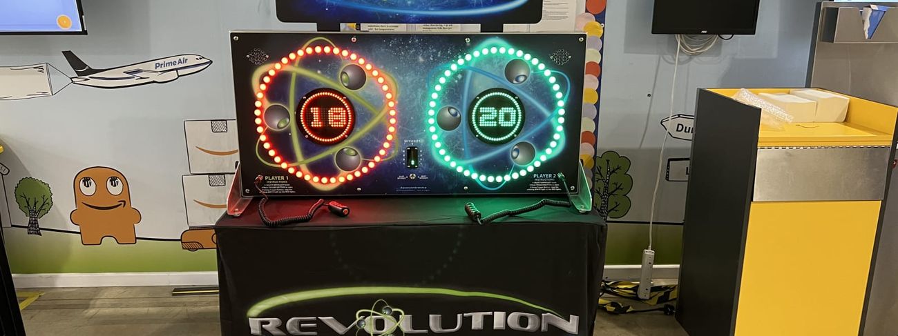 Revolution Reaction Test Game on a Revolution-branded skirt at an Amazon Associate Forum corporate event