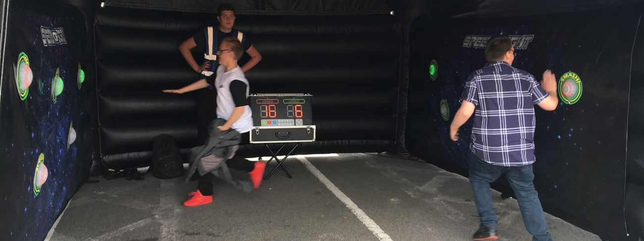 Players competing inside the inflatable arena outdoors