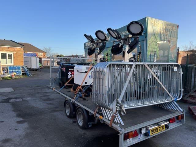 Loaded on trailer with barriers at the yard