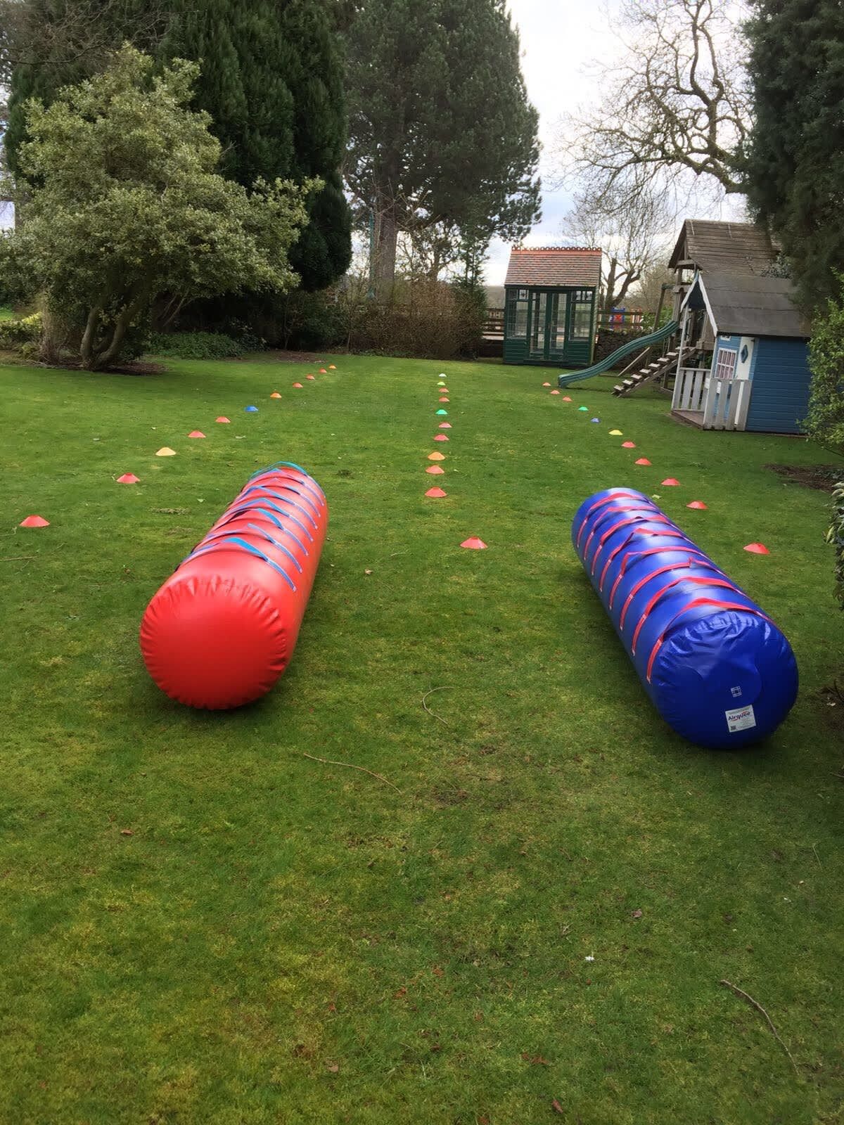 Tubes set up on lawn with cone lanes