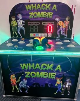 Whack a Zombie unit close-up with lit scoreboard reading 0 - 0